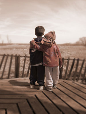 Children looking over fence